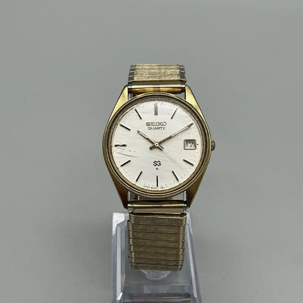 Vintage Seiko Mens Watch 34mm Gold Tone Stretch Band Date 8222-7009 New Battery